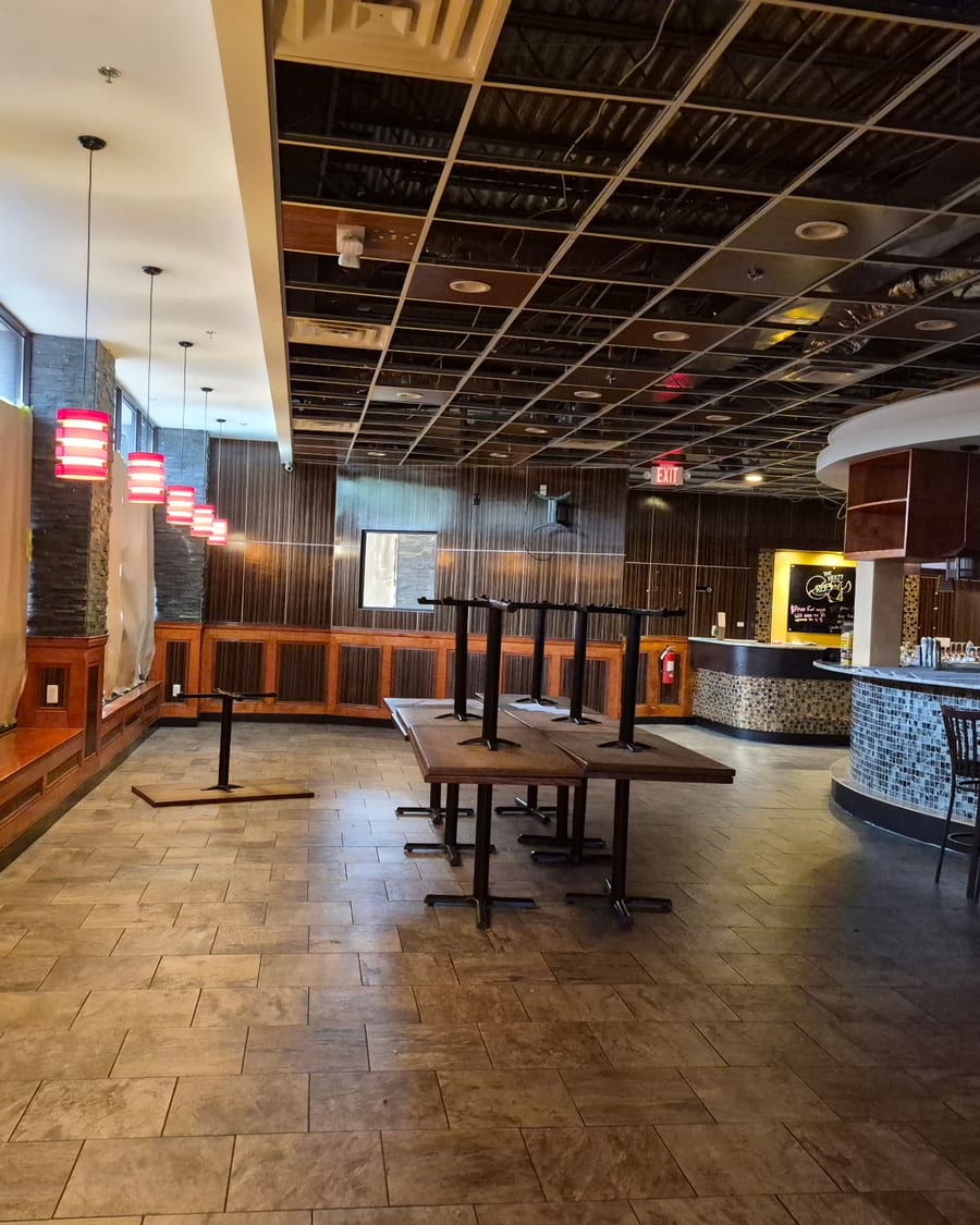 The dining room and mosaic-tiled bar taking shape inside